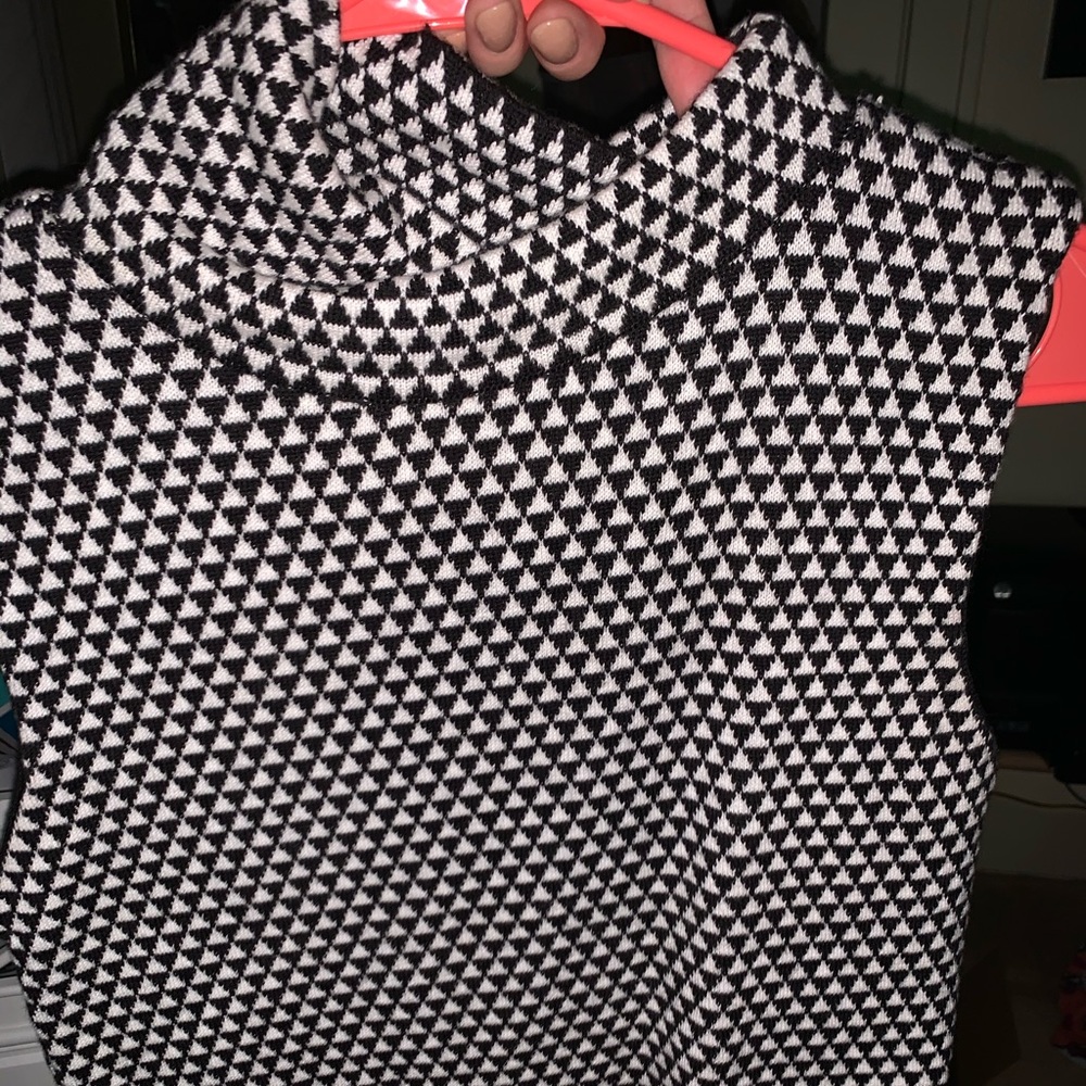 Mock neck Black and White Checkered Sweater.